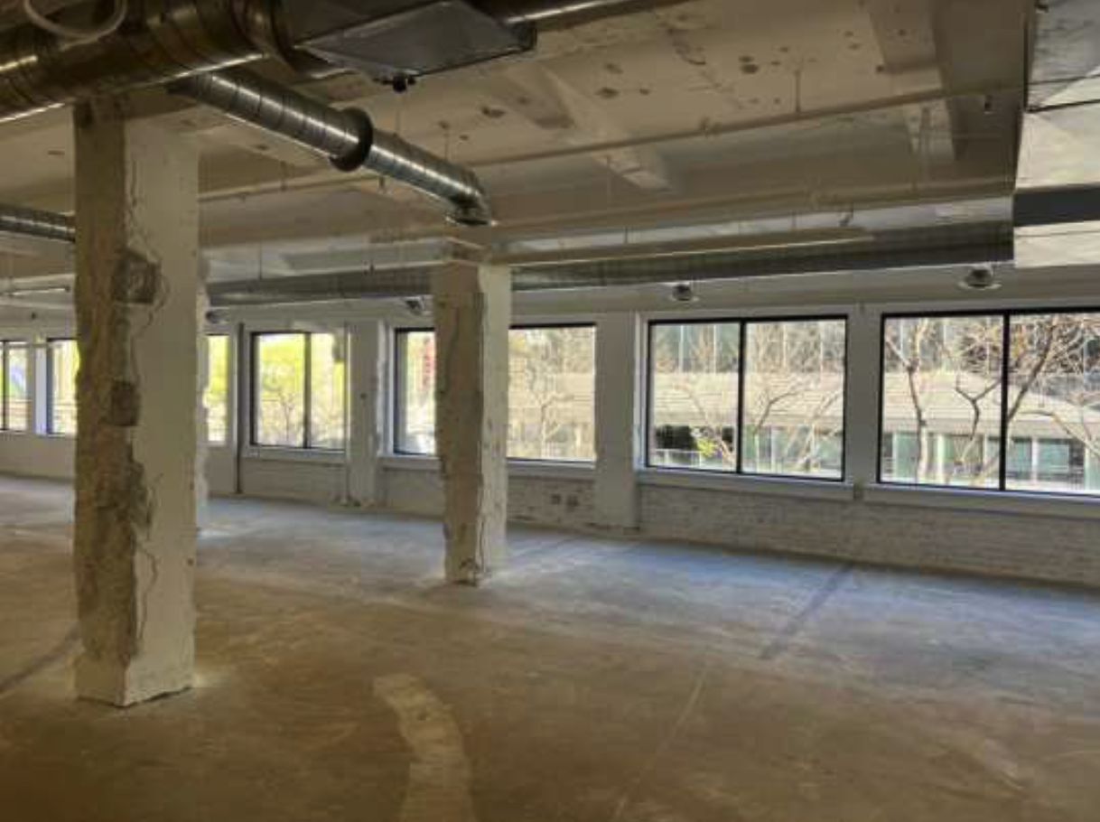 The interior of an existing office building in downtown Denver
that is in the early stages of the design process to be converted
into multifamily dwelling units.